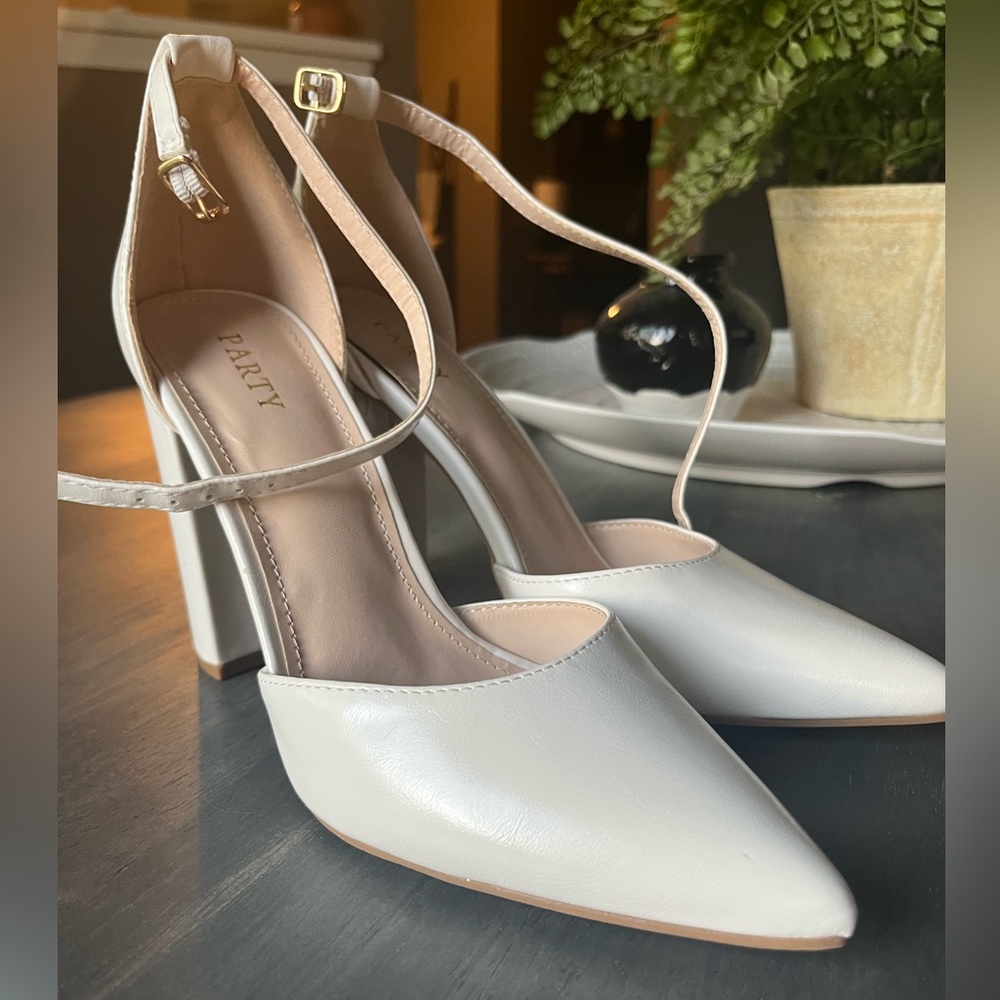 White closed toed heels